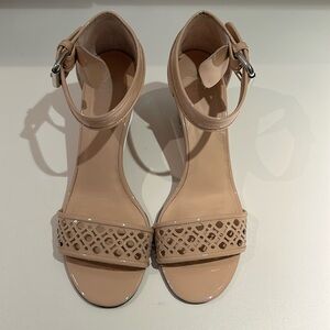 Nude Aquatalia wedge shoes.